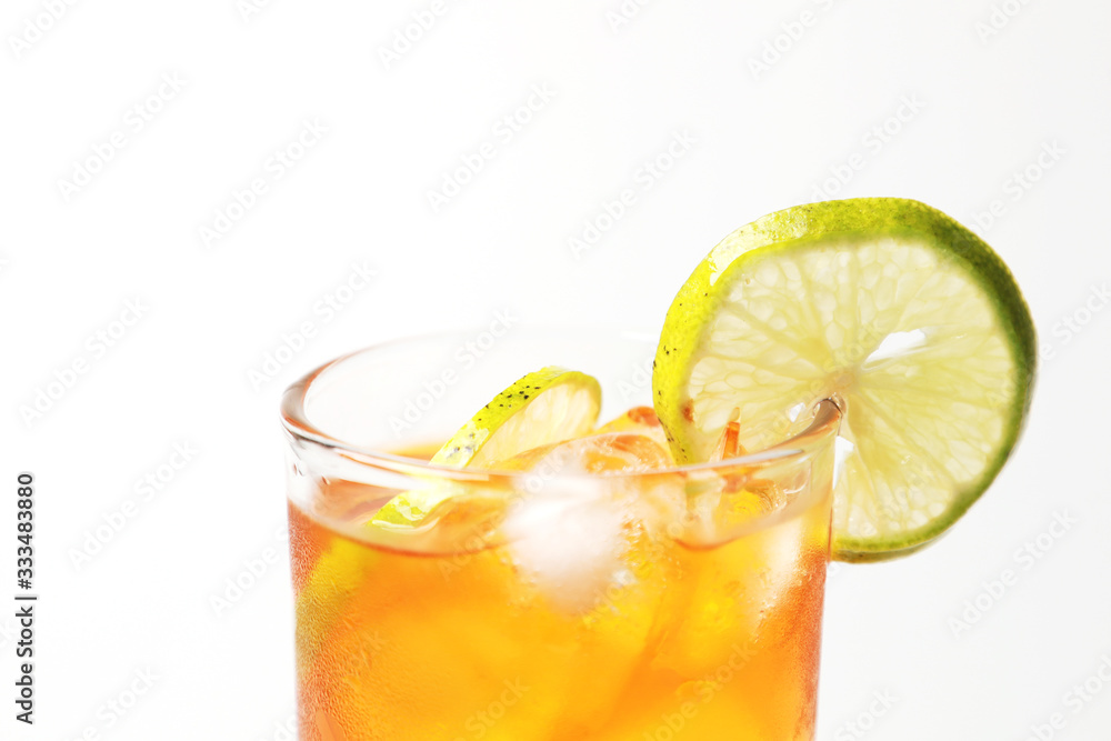 Iced tea lemon juice fresh drink on white bakcground, Isolate black tea and lime lemon in the glass cocktail drink. Iced tea lemon juice fresh drink on white bakcground, Isolate black tea and lime lemon in the glass cocktail drink.