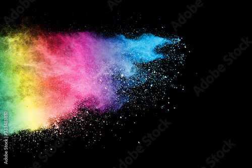 Freeze motion of colorful color powder exploding on black background. Paint Holi.Indian festival Holi