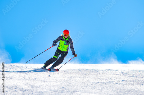 A girl skiing on the ski slope