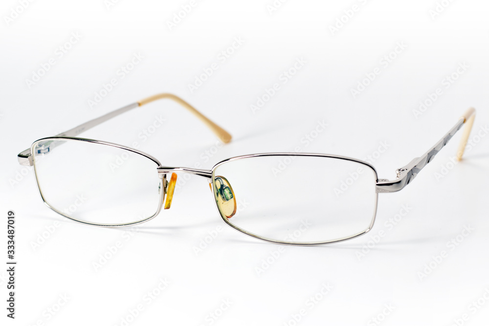 Glasses on isolated white Optic glasses. close up Glasses on isolated white Optic glasses. close up