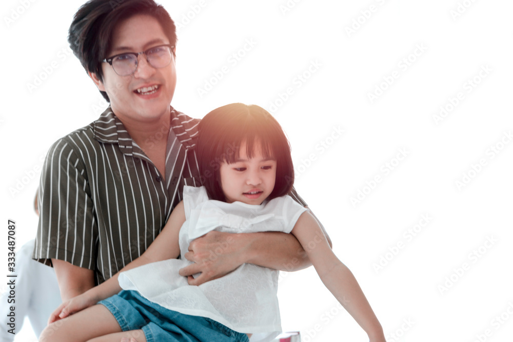 Father playing with daughter, daddy carrying his little cute girl, happy family spending fun time together at home Father playing with daughter, daddy carrying his little cute girl, happy family spending fun time together at home
