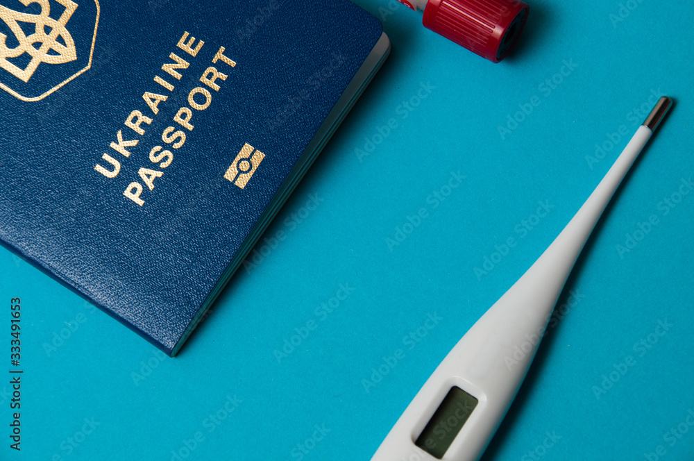Coronavirus and travel concept. Note the coronavirus COVID-19 and passport. A new outbreak of the corona virus. Coronavirus and travel concept. Note the coronavirus COVID-19 and passport. A new outbreak of the corona virus.