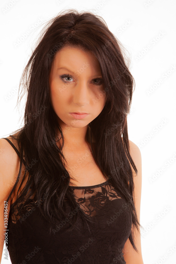 Attractive dark haired girl against a white background Attractive dark haired girl against a white background