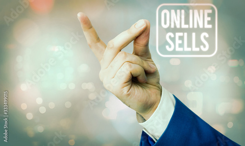 Writing note showing Online Sells. Business concept for sellers directly sell goods or services over the Internet