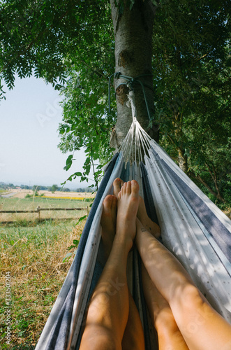 Couple relaxing on vacation in hammock