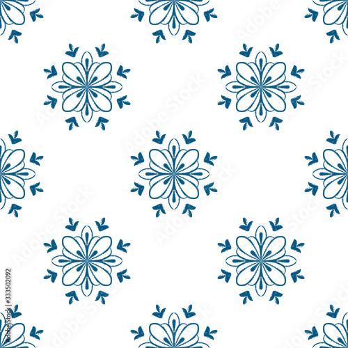 Blue mandala seamless pattern design. Doodle flower illustration.