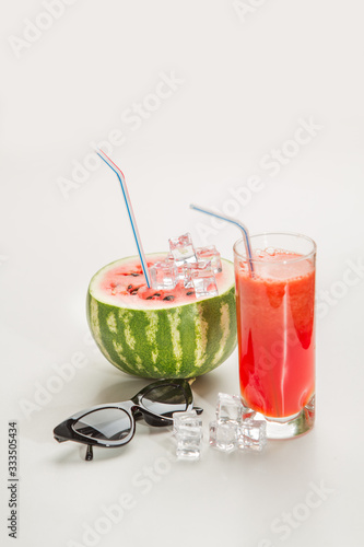 Watermelon juice with a straw , summer concept, romantic couple entertaining event at home