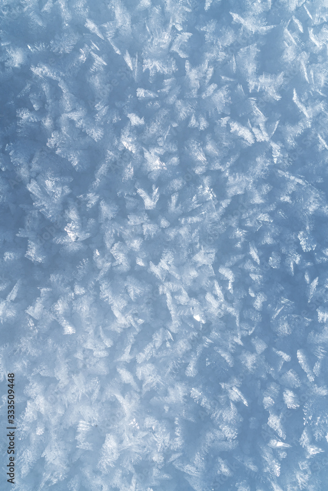 Fototapeta premium Snow crust top view winter high definition white background.