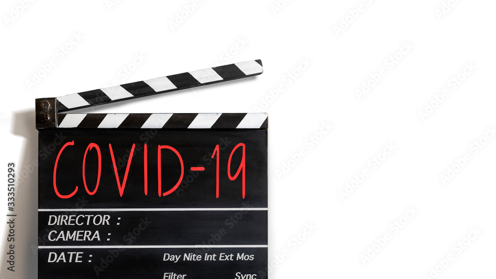 COVID-19 text title on film slate.