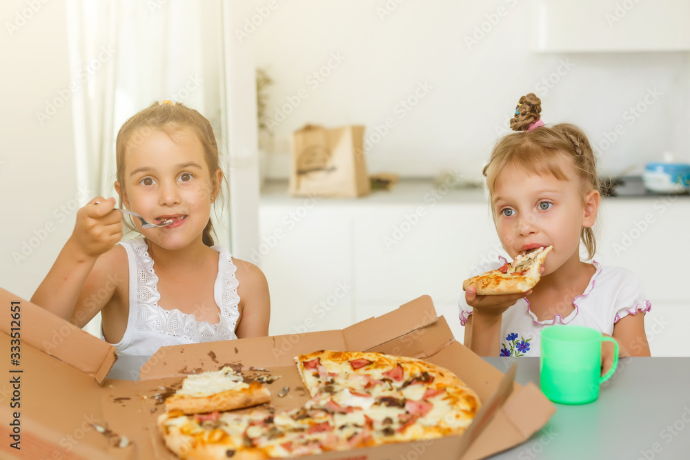 Two friends holding pizza - having fun eating dinner - Rebel concept Two friends holding pizza - having fun eating dinner - Rebel concept