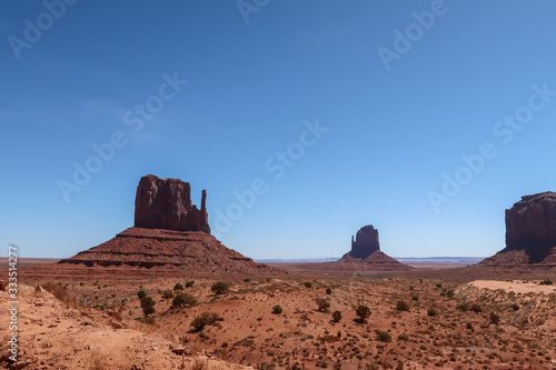 Desert landscape of buttes and monoliths at Monument Valley in Arizona