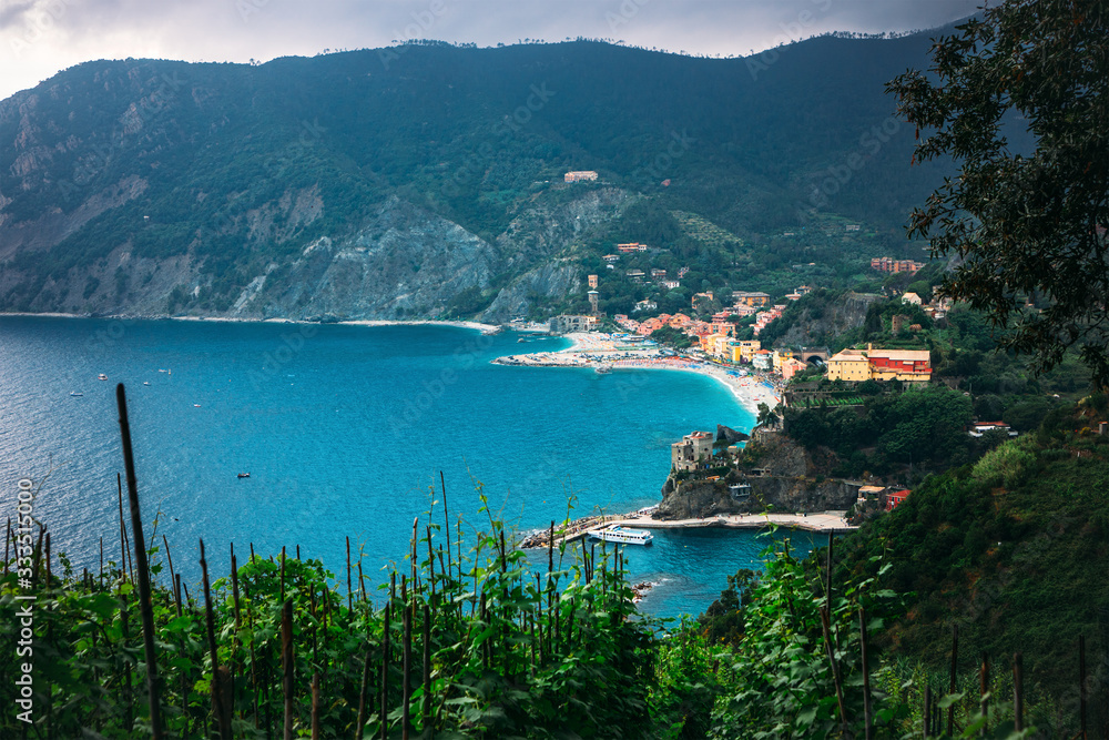 Beautiful wide panoramic view of Mediterranean turquoise sea visible from the hiking Cinque Terre trail from Vernazza to Monterosso al Mare in Italy. 