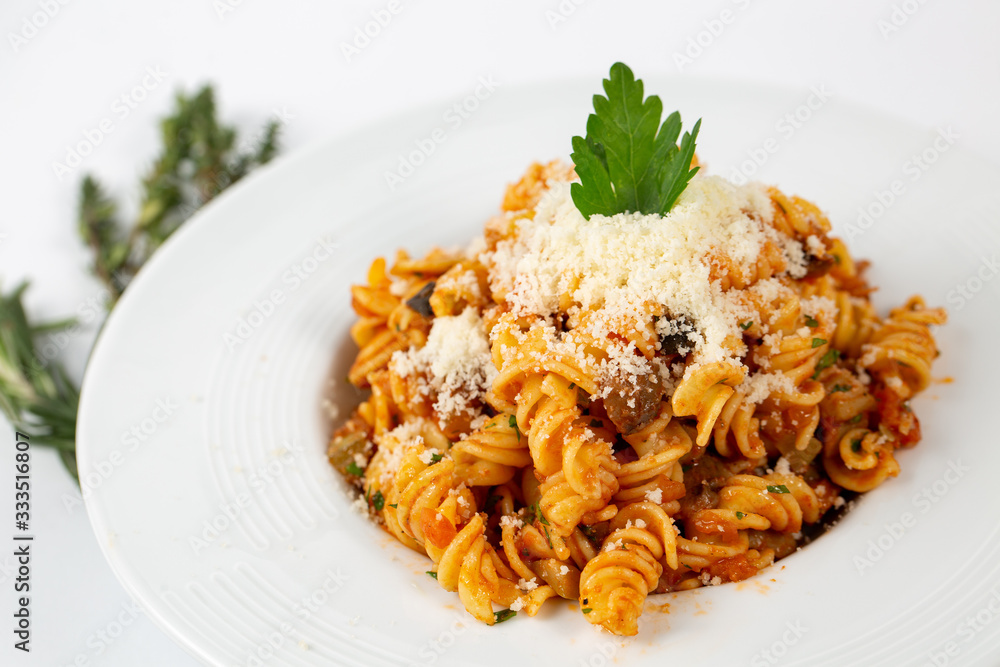 Fresh Bolognese pasta in a white plate