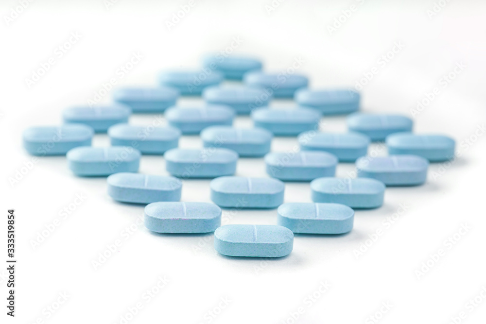 medicine tablets arranged on white background medicine tablets arranged on white background