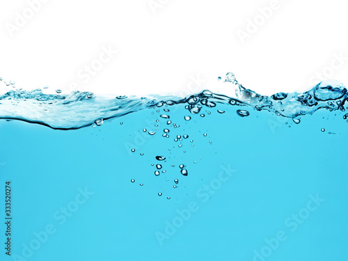 blue water surface with splash, waves and air bubbles on white background	