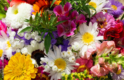 bouquet of various summer flowers as background