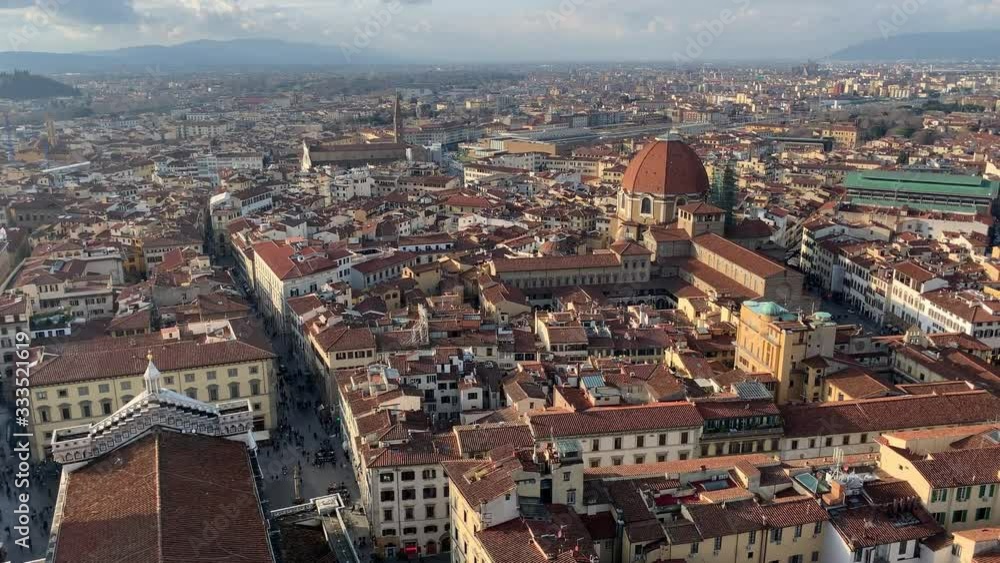 FLORENCE, ITALY - JANUARY 25, 2020. Aerial view of Florence, Tuscany, Italy. Historically and culturally rich Italian town center. Beautiful old city at sunny sunset day FLORENCE, ITALY - JANUARY 25, 2020. Aerial view of Florence, Tuscany, Italy. Historically and culturally rich Italian town center. Beautiful old city at sunny sunset day