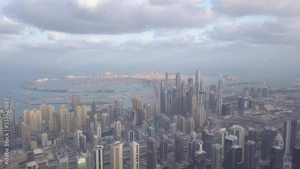 Dubai Marina, Palm Jumeirah in clouds. View from the drone Dubai Marina, Palm Jumeirah in clouds. View from the drone