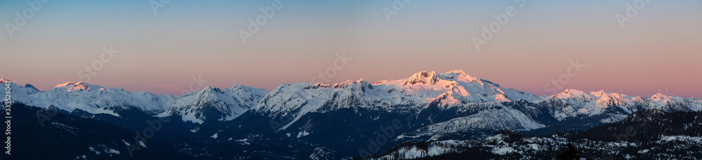 Beautiful Aerial Panoramic View of Canadian Mountain Landscape during a colorful sunset. Taken in Squamish, North of Vancouver, British Columbia, Canada. Nature Background Panorama