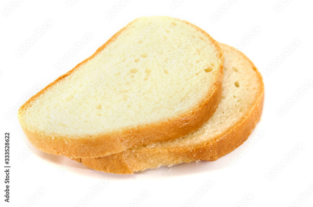 Two slices of white bread Isolated on a white background. Close-up.