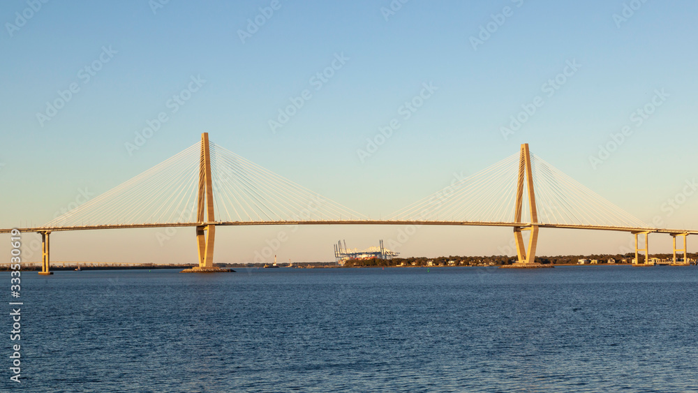 Charleston, South Carolina, USA - February 27, 2020: Arthur Ravenel Jr. Bridge,  a cable-stayed bridge over the Cooper River in Sunset  
in South Carolina, USA. 