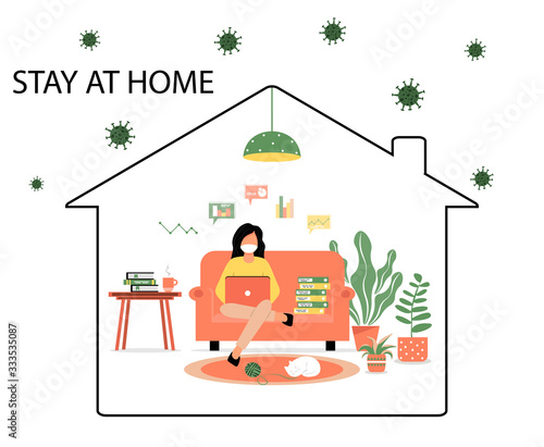 Work at home during an outbreak of the COVID-19 virus. People work at home in self-isolation to prevent the spread of the virus. A girl works or studies online at home. Coronavirus quarantine concept.