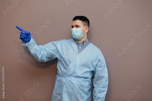 Covid-19 virus doctor wearing surgical mask to protect against Coronavirus virus and pandemic