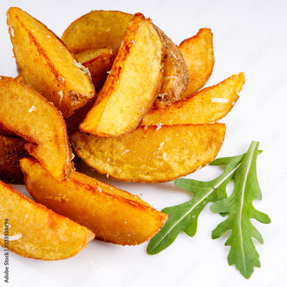 fried potato wedges on a white background for the site fried potato wedges on a white background for the site