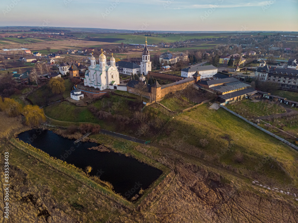 Beautiful view of Zimnensky Svyatogorsky monastery from above. View of the domes and the Assumption Cathedral.