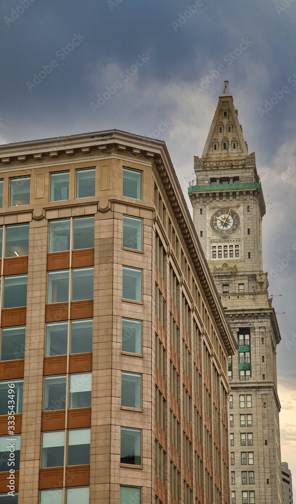 An old office building and a classic clock tower in Boston, Massachussetts An old office building and a classic clock tower in Boston, Massachussetts