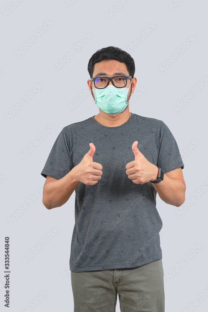 Young man doing concepts wear protective mask against infectious diseases and flu with clipping path,Corona Virus 2019-ncov Young man doing concepts wear protective mask against infectious diseases and flu with clipping path,Corona Virus 2019-ncov