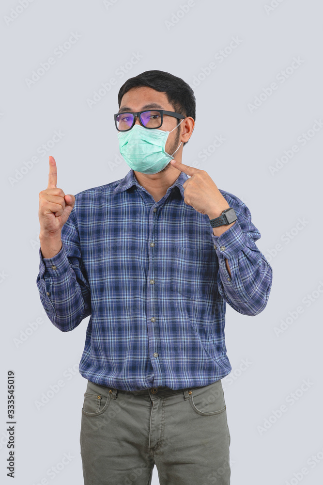 Young man doing concepts wear protective mask against infectious diseases and flu with clipping path,Corona Virus 2019-ncov Young man doing concepts wear protective mask against infectious diseases and flu with clipping path,Corona Virus 2019-ncov