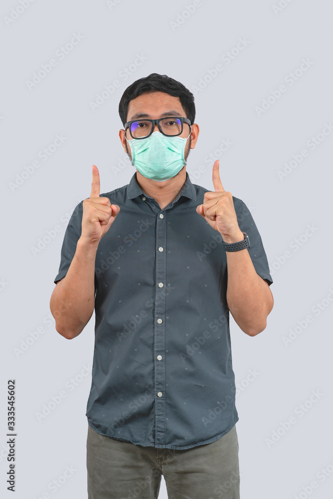 Young man doing concepts wear protective mask against infectious diseases and flu with clipping path,Corona Virus 2019-ncov Young man doing concepts wear protective mask against infectious diseases and flu with clipping path,Corona Virus 2019-ncov