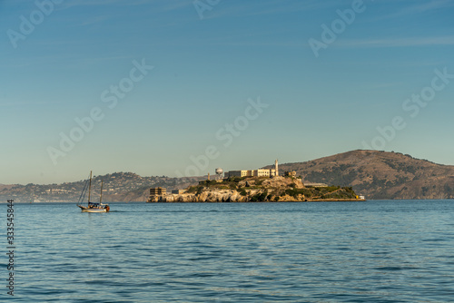 View of Large Sail Boat and Alcatraz Prison in San Francisco