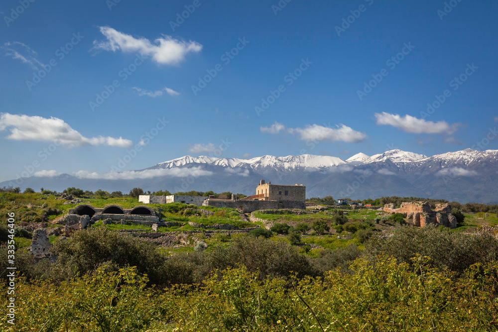 Naklejka premium Ruins of ancient town Aptera with mountains in background, Crete, Greece