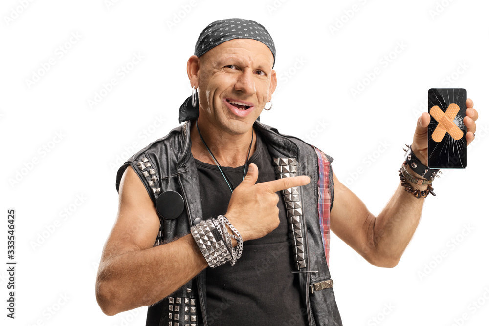 Punker pointing to a smartphone with a broken screen and adhesive bandage on the screen Punker pointing to a smartphone with a broken screen and adhesive bandage on the screen