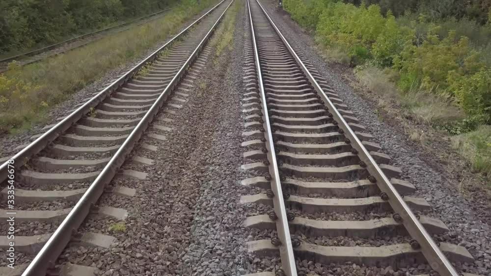 Aerial top view of empty train rails Aerial top view of empty train rails
