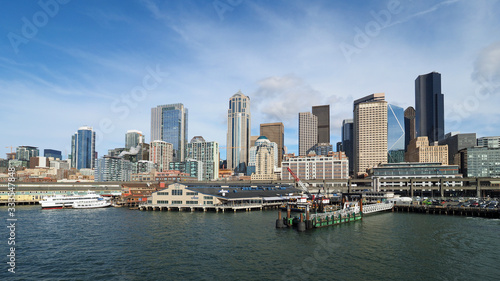 Seattle, Washington - February 10, 2018 - Skyline of city of Seattle from Seattle - Bainbridge Island ferry on sunny winter afternoon.