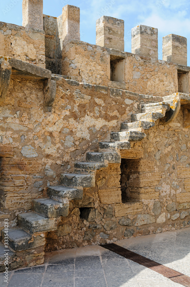 Stone stairs leading up to the fortified walls and ramparts at Capdepera Castle, Mallorca/Majorca