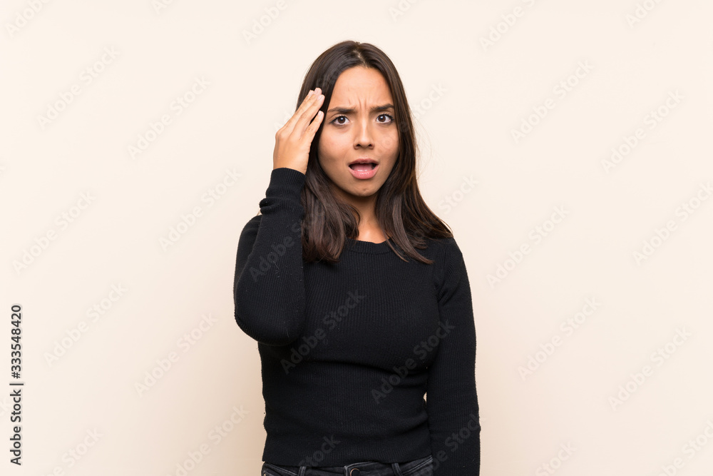 Young brunette woman with white sweater over isolated background has just realized something and has intending the solution Young brunette woman with white sweater over isolated background has just realized something and has intending the solution