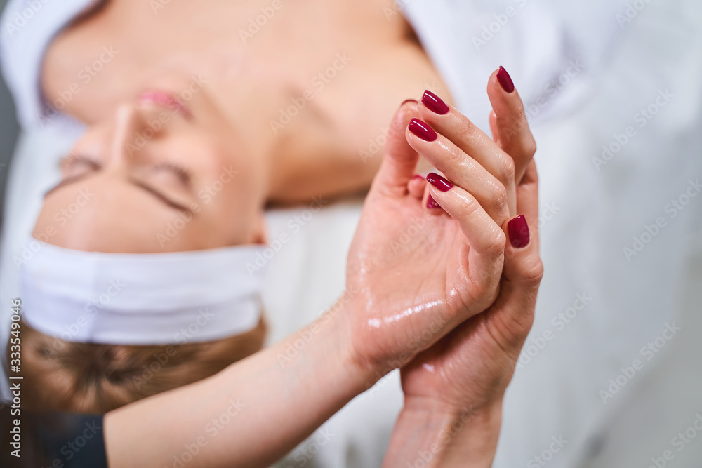 Close up female hands that being on the foreground Close up female hands that being on the foreground