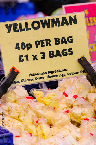 Bags of yellowman, a traditional type of honeycomb, on sale at the Ould Lammas Fair in Ballycastle photo