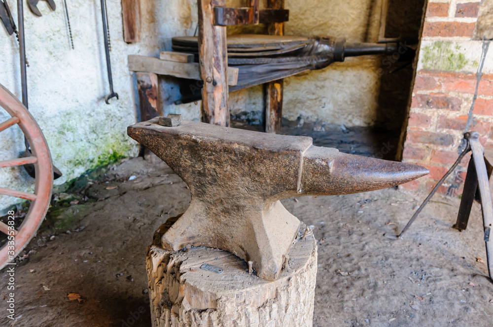 Iron anvil inside a blacksmith's workshop