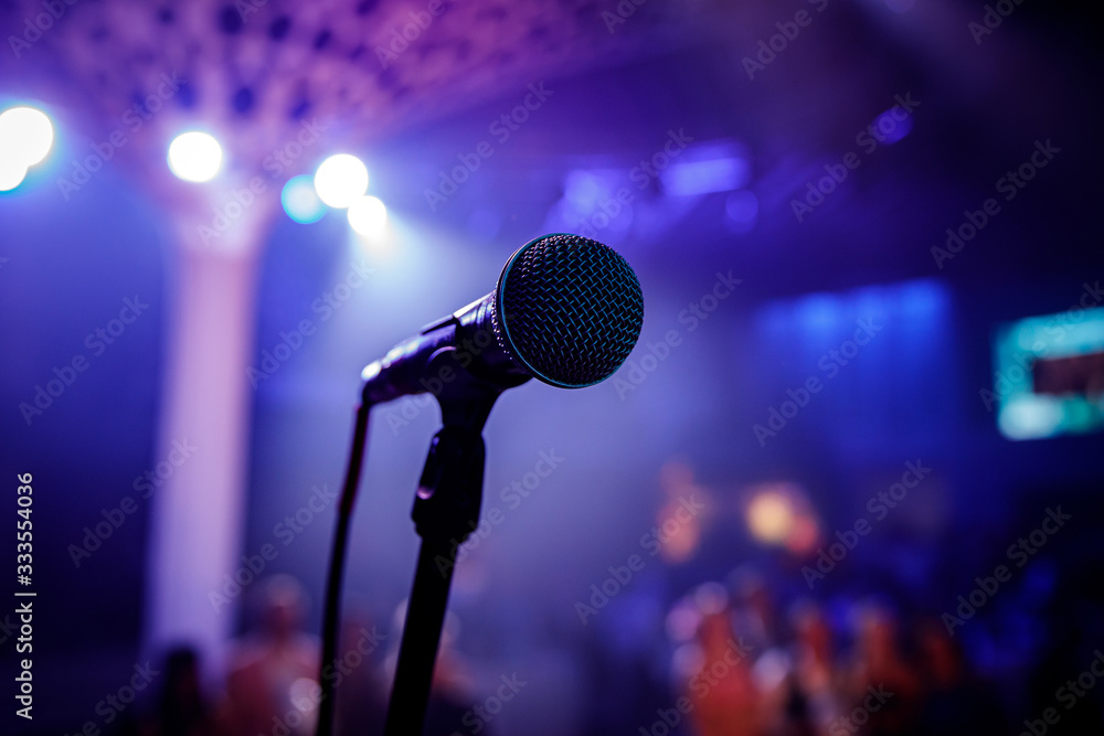 The microphone on stage before the artist performance. - obrazy, fototapety, plakaty 