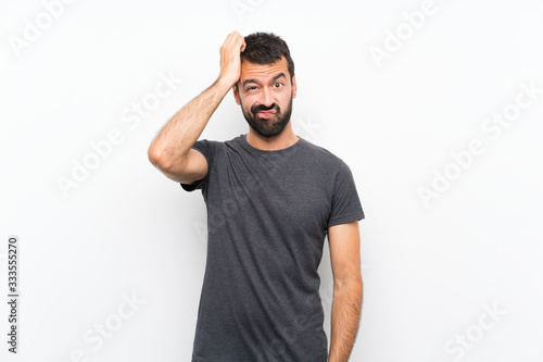 Young handsome man over isolated white background with an expression of frustration and not understanding