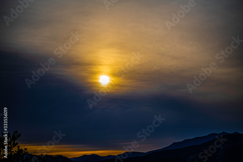 orange sunrise over mountains