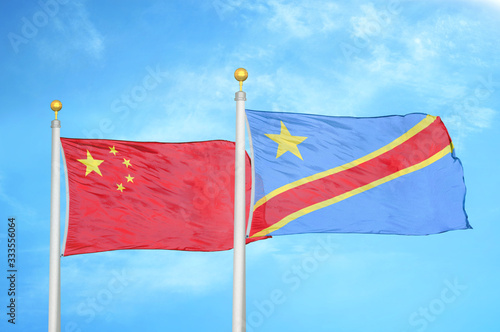 China and Congo Democratic Republic two flags on flagpoles and blue cloudy sky