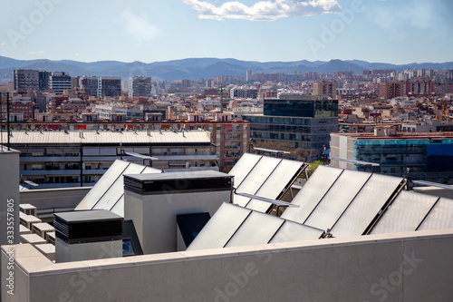 Renewable, alternative solar energy, photocell - solar panels on the roof of the building.