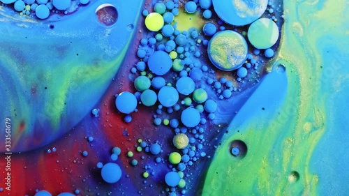 Beautiful paint and ink in oil, blue colorful bubbles. Abstract colorful paint.
