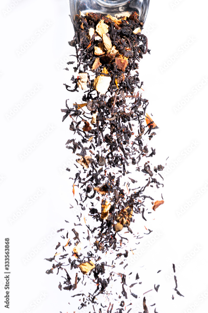 tea herbs falling from the spoon tea herbs falling from the spoon